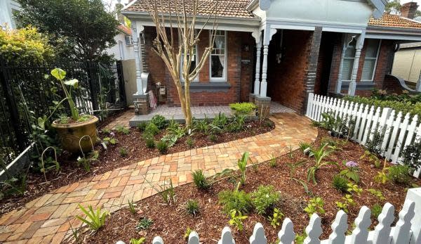 The integration of a new footpath not only enhances the garden's accessibility but also adds an element of sophistication to the overall design.